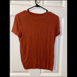 Distressed arie tee- in good condition